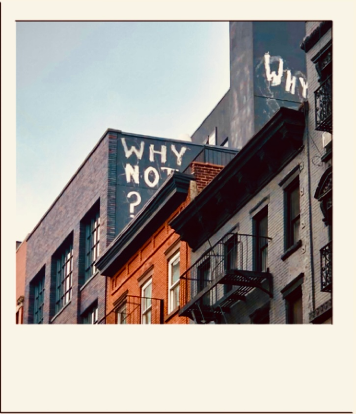 New York City building with 'Why Not' text representing MONA WIE's alternative approach to Black Friday and intentional fashion consumption