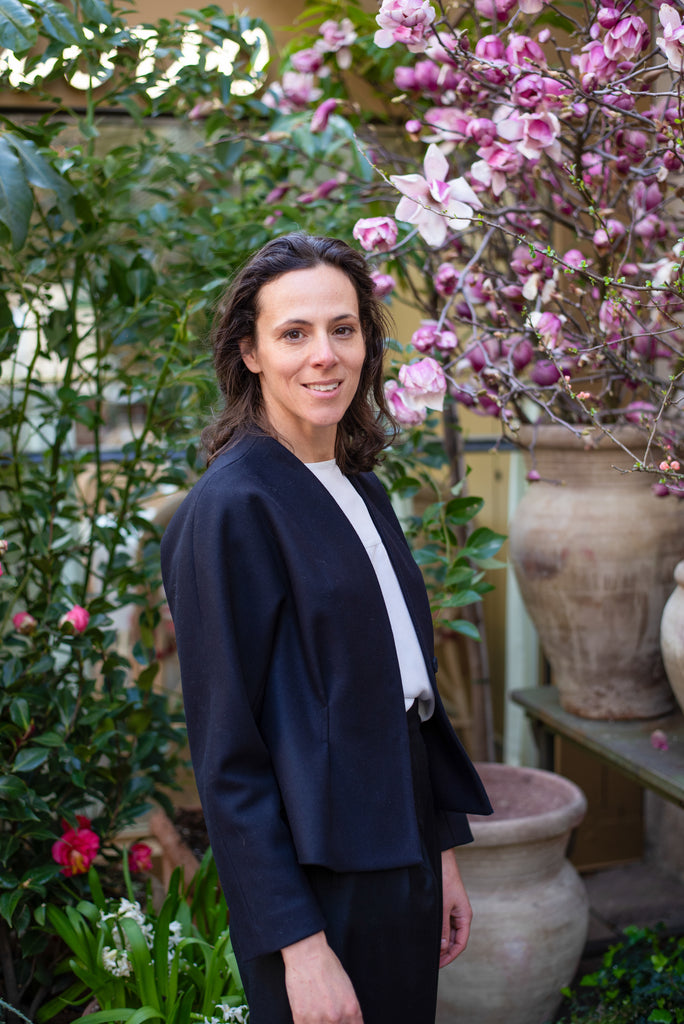 Detail of the structured shoulders on the black Joan jacket.