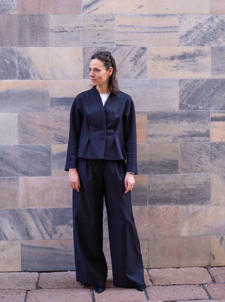 Joan structured jacket in black wool blend.