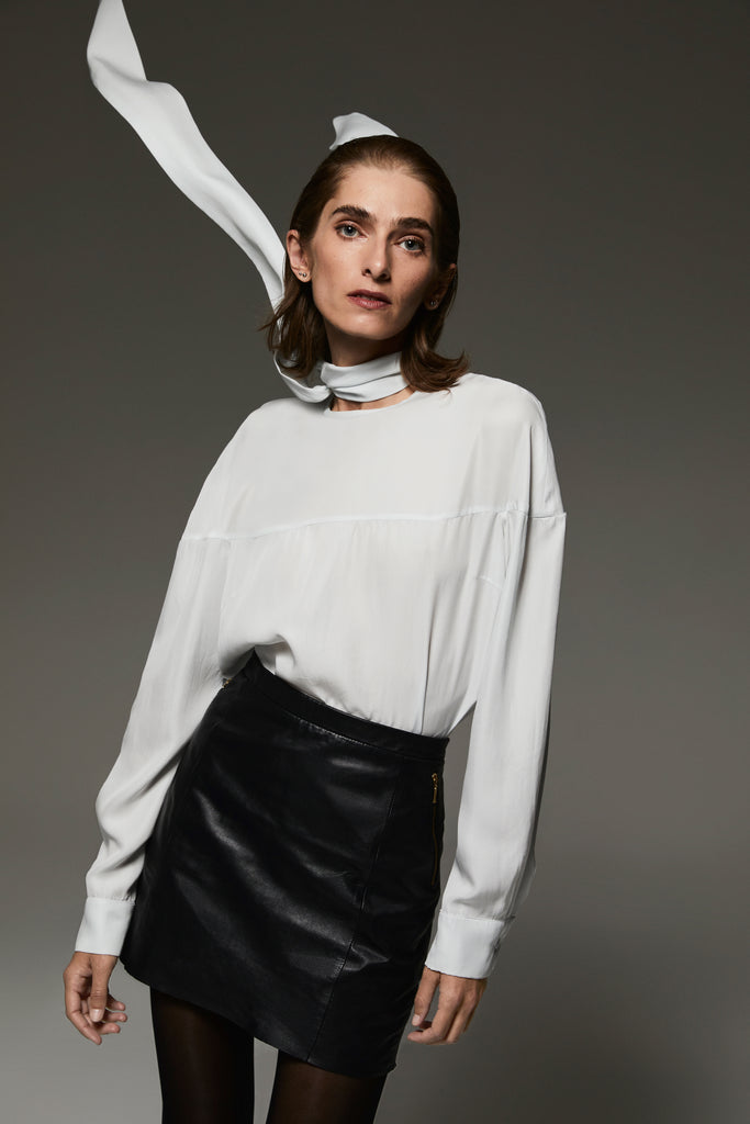 Close-up of the detachable bow on the Alex silk blouse