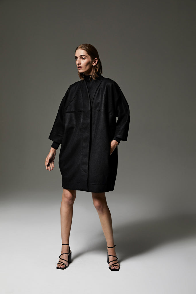 Alexandra cocoon coat in black fine melton wool with concealed fastening
