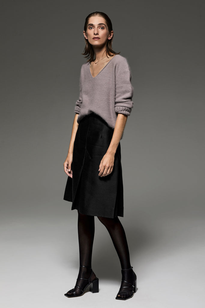 Silk bias tape finishing on the hem of the Emma wool-silk skirt